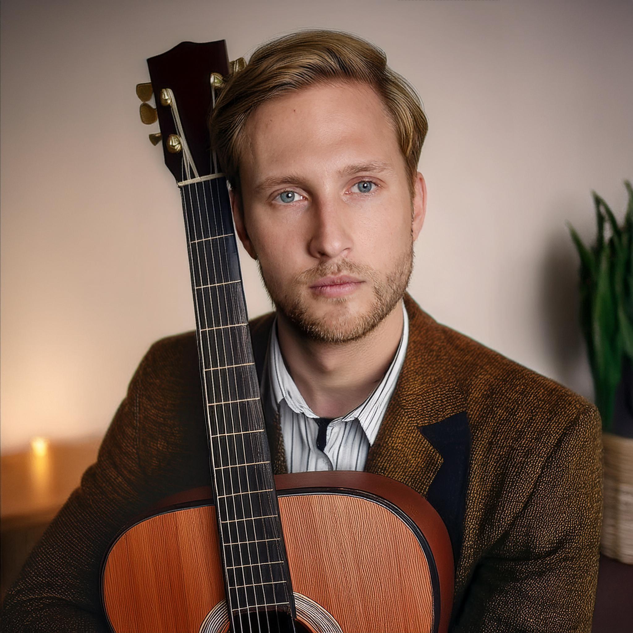 Portrætbillede af countrysangeren Alexander Allé
